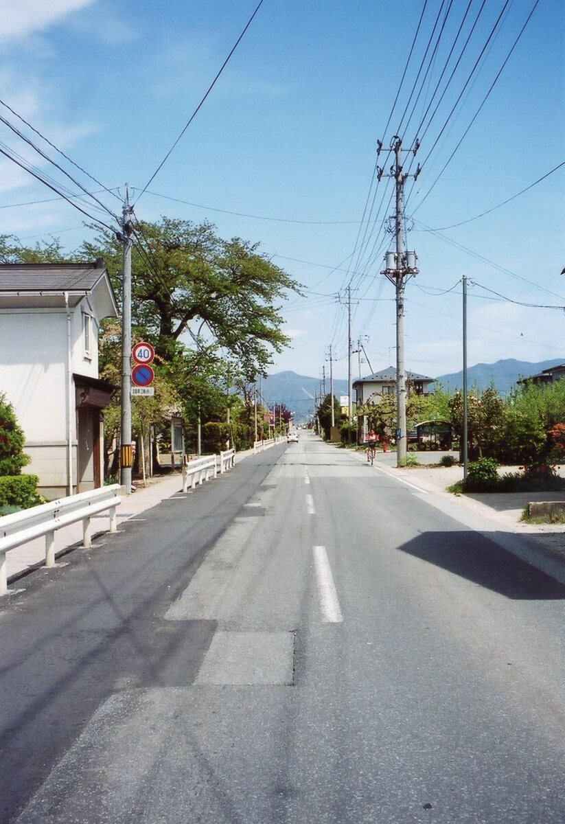 〔写真〕板垣新田地内/三島県令道路改修記念画帖　其之三　北村山郡神町村地内新道ノ内字板垣新田ヨリ関山村地方ヲ望ム図